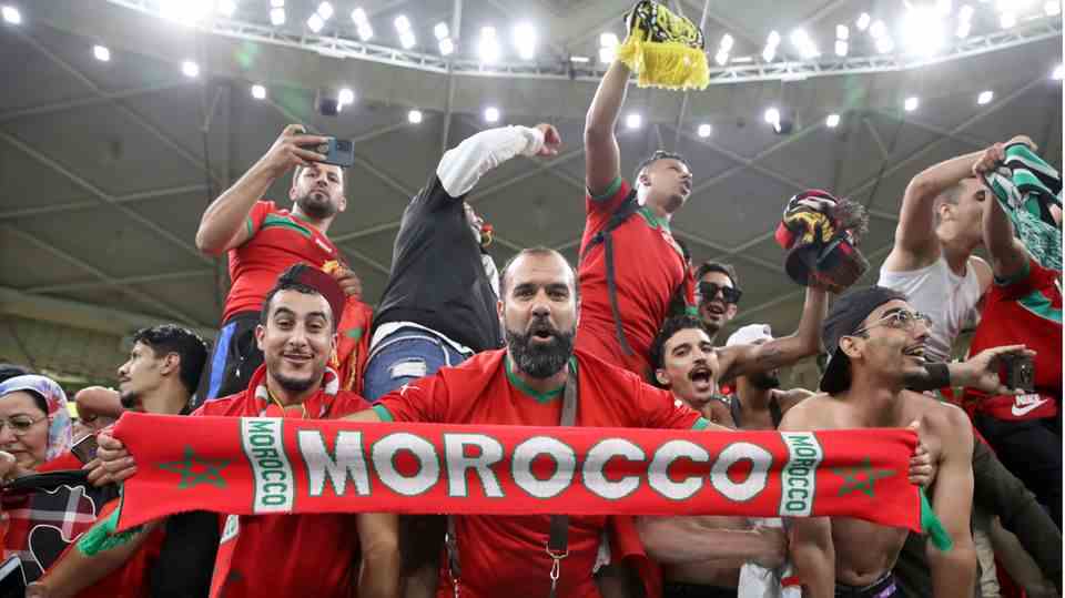 Morocco's fans celebrate entering the semi-finals of the World Cup in Qatar