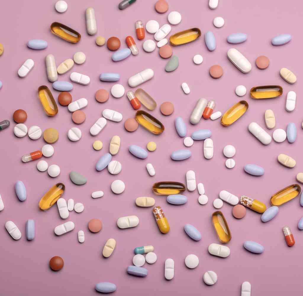 Pills on a violet background