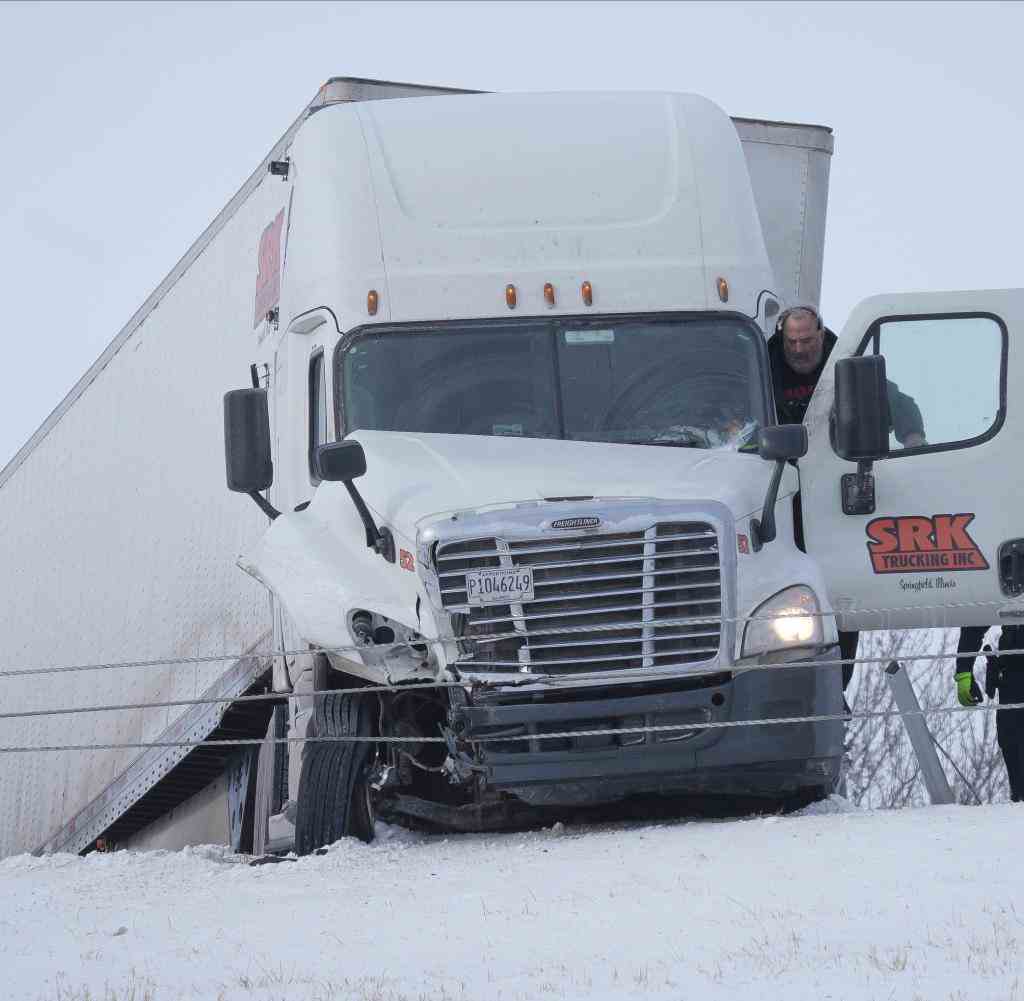 A truck slid into the lane boundary on Interstate 80 in Des Moines, Iowa