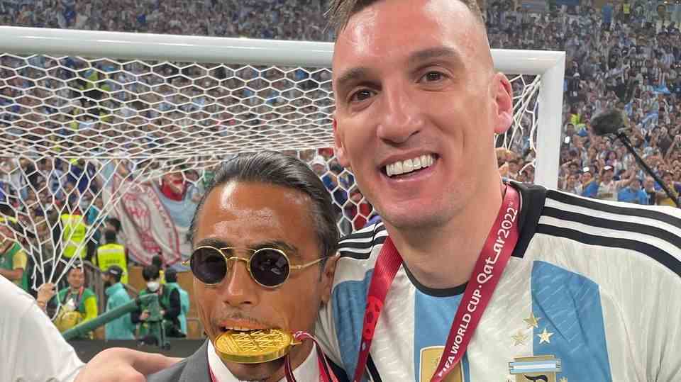 "Saltbae" on the field with medal in mouth.
