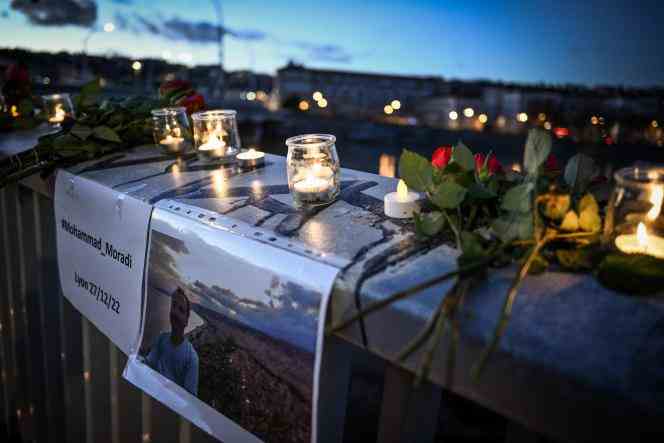 Candles lit to pay tribute to Mohammad Moradi, in Lyon, on December 27, 2022.