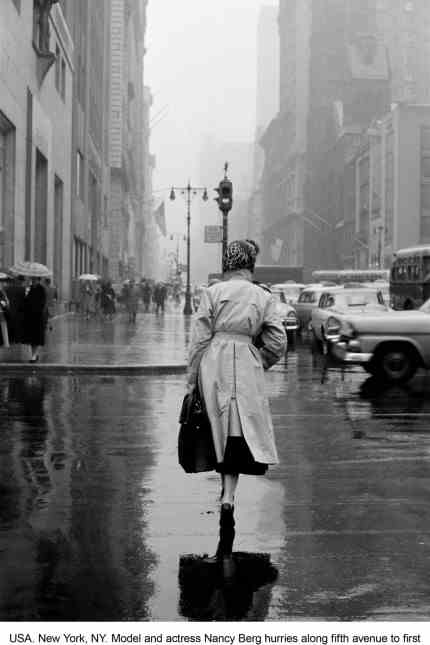 Photographer Inge Morath: Model and actress Nancy Berg hurries down Fifth Avenue early one morning in 1956.