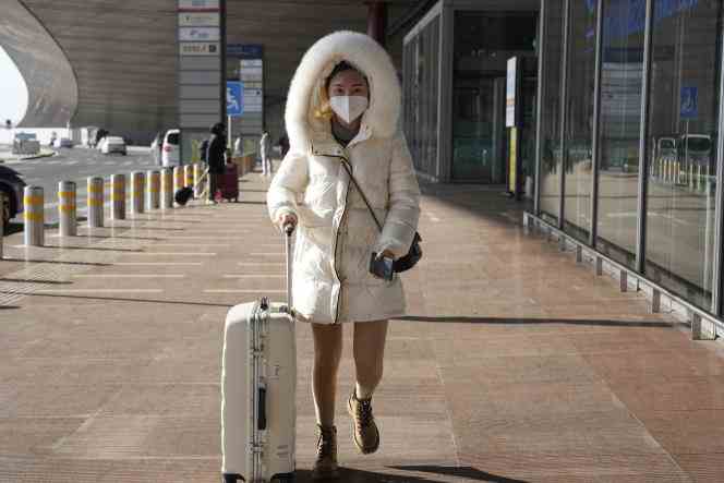 A traveler at the airport in Beijing, China, December 13, 2022. 