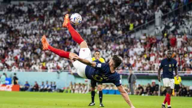France at the World Cup: artists on the ball: This spectacular side kick didn't count, but Olivier Giroud still scored a goal against Poland.