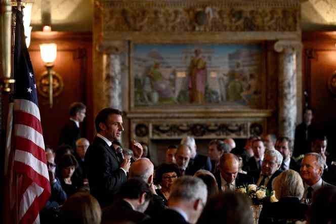 French President Emmanuel Macron speaks during a working lunch on climate and biodiversity issues, with US climate envoy John Kerry, before members of Congress, at the Library of Congress in Washington, November 30, 2022. 