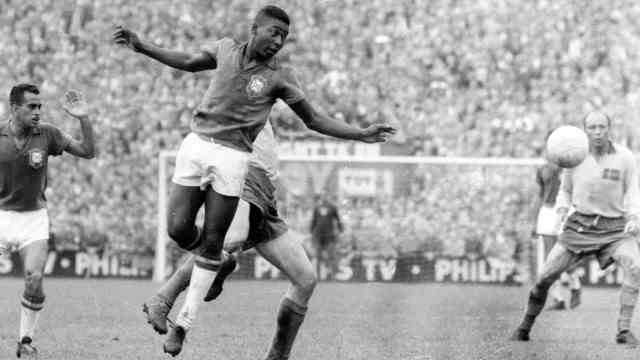 Reactions to Pelé's death: Young Pelé in the 1958 World Cup final in Stockholm.  He wins his first of three world titles.  No player ever won more.