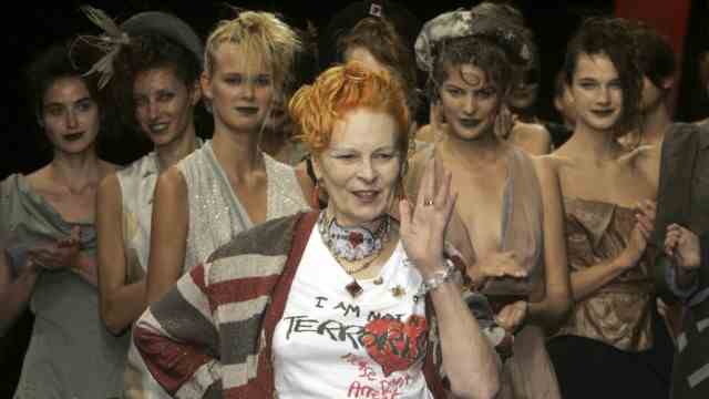 Fashion designer: Westwood with models at one of her fashion shows in Paris in 2005.