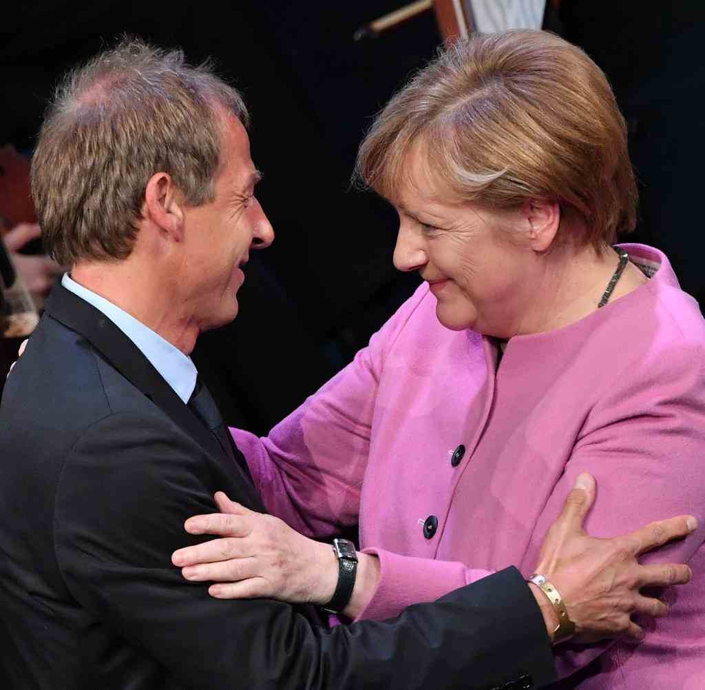 Jürgen Klinsmann und Angela Merkel