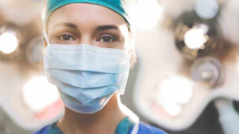A woman is in the operating room