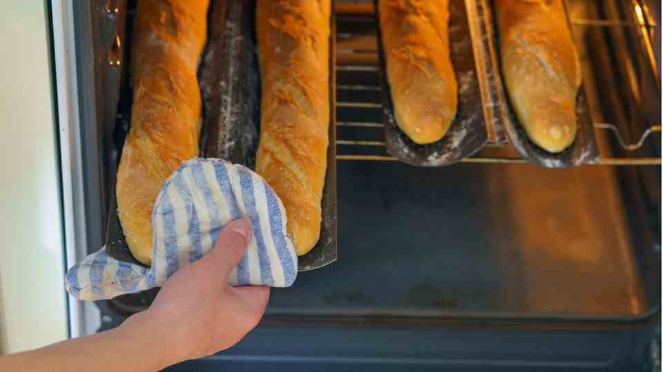 French baguettes on a baking sheet