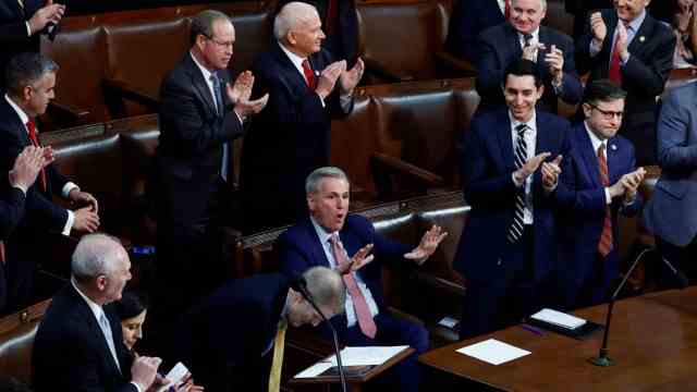 United States: Cheering too soon: Republican Kevin McCarthy (seated) rejoices after his nomination for election as Speaker of the House.