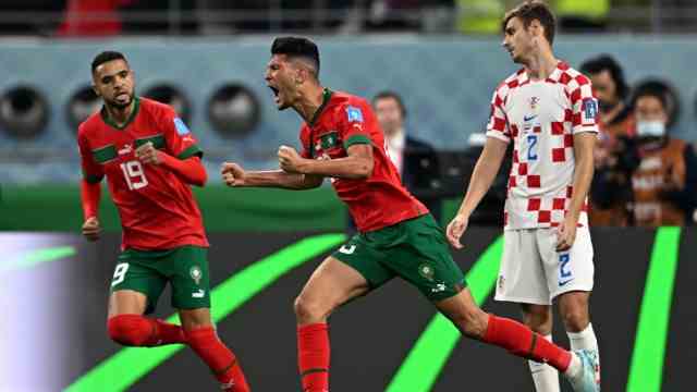 Sporting goods: Morocco were the surprise team at the World Cup - and played in Puma jerseys (in red).