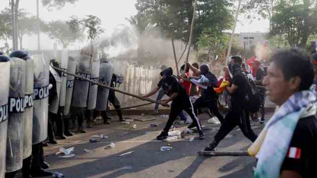 South America: Street fury meets massive police presence in Lima.