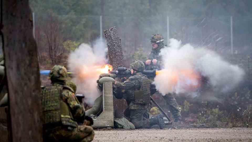 Bundeswehr soldiers on an exercise in Norway.  Lightning and smoke are clearly visible.