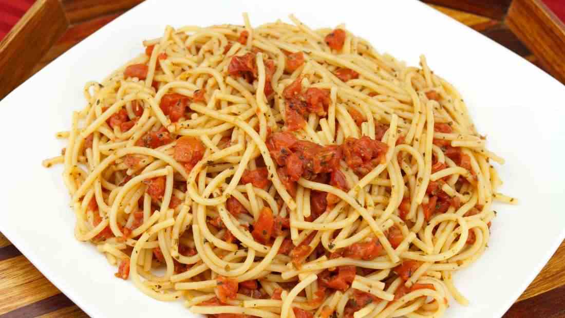 Full plate of pasta and tomato sauce