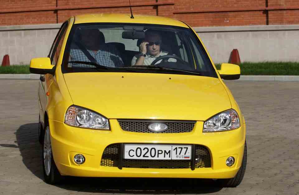 Vladimir Putin took a spin in a yellow Lada Kalina made by Russian automaker AvtoVAZ in 2010