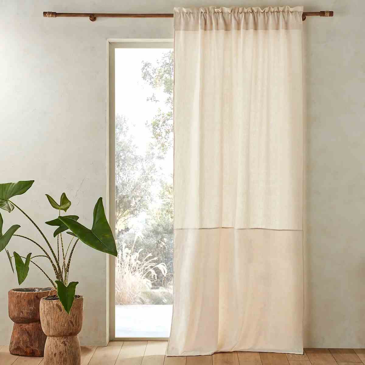 A Bi-Material Linen And Velvet Curtain To Enhance Industrial Decor