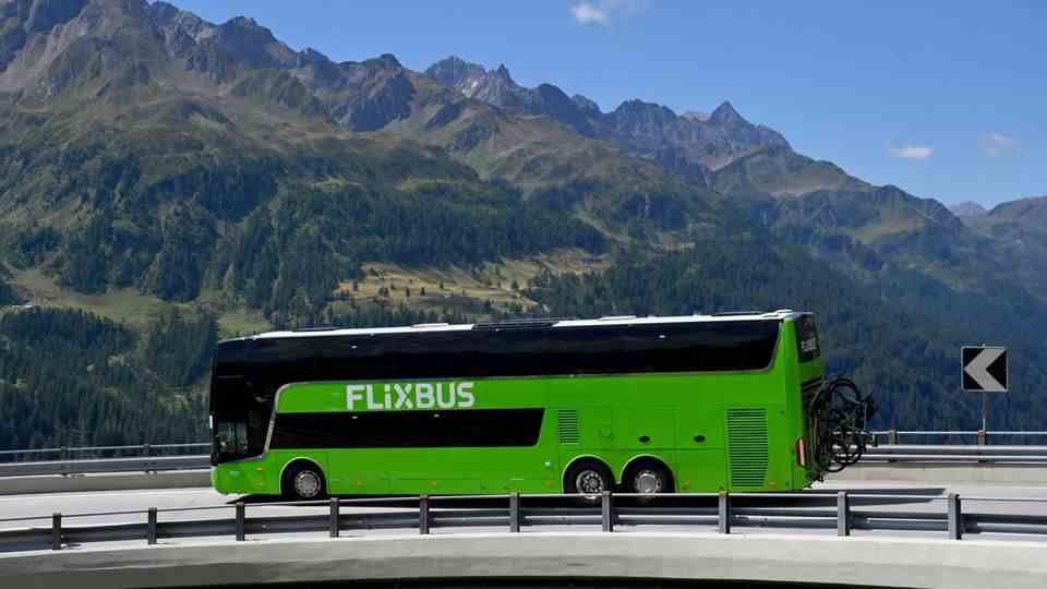 A Flixbus on the pass road of the Gotthard Pass in Switzerland