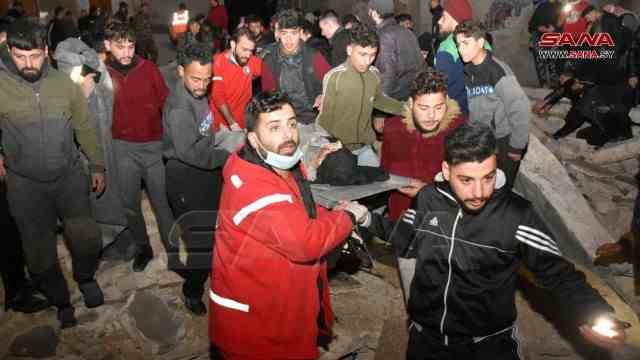 Syria and Turkey: rescue workers in Hama, Syria