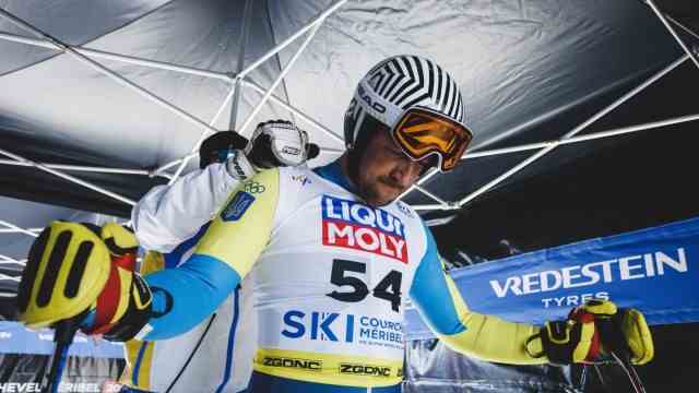 Bach, Russia and Olympics: Balancing act: Ukraine's Ivan Kovbasnyuk tries to focus on downhill racing while friends and family die back home.