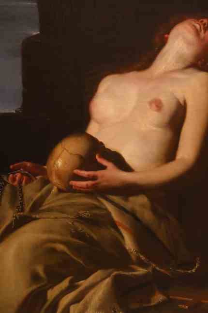 Exhibition: The Penitent Mary Magdalene by Guido Cagnacci (1601 - 1663) holds a skull in her lap.  Anyone standing in front of the original can clearly see the zeal the painter put into the luster of her youthful breasts.