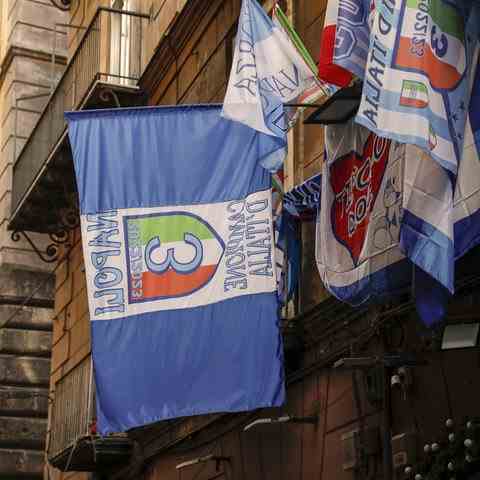 SSC flags hang from balconies in Naples