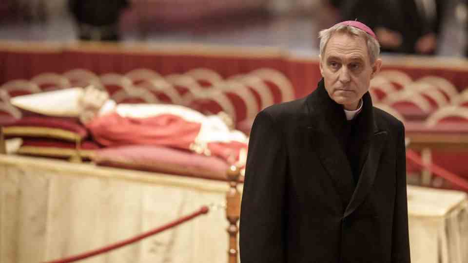 Georg Gänswein, Archbishop of the Curia and former private secretary of the late Pope, is standing by the body of Pope Emeritus Benedict XVI, which is publicly laid out in St. Peter's Basilica