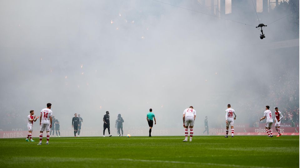 Pyrotechnics during the Bundesliga duel between 1. FC Koln and Borussia Mönchengladbach