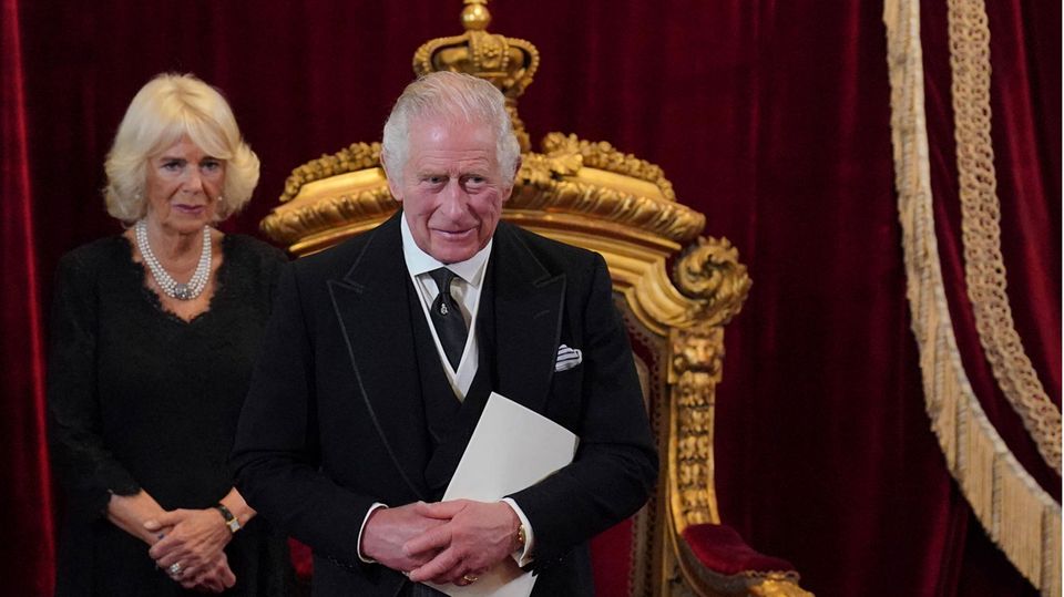 The brooch on his tie is for King Charles III.  more than just an accessory