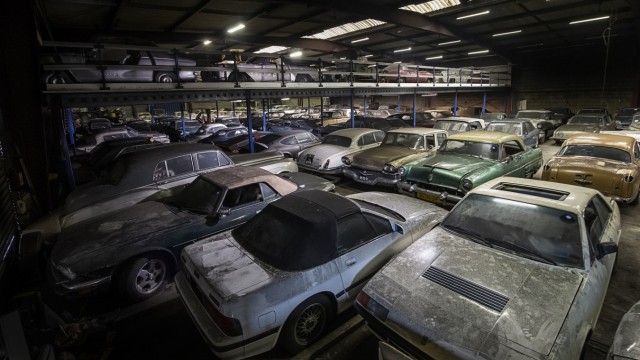 Barn find: Most of the automobiles are covered in a thick layer of dirt and dust.