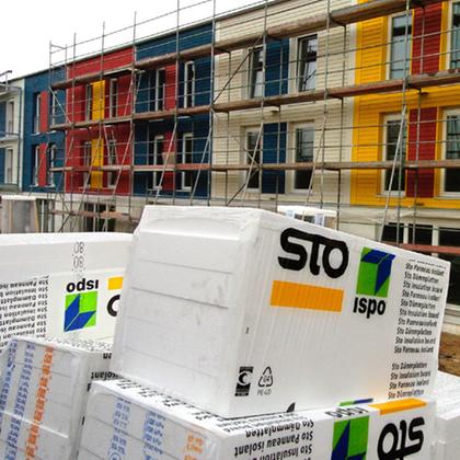 Styrofoam insulation panels are in front of a passive house cell in a new development area in Darmstadt.