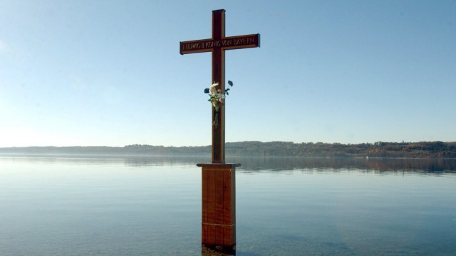 Worth reading: The memorial cross for King Ludwig II in Lake Starnberg near Berg (Bavaria).