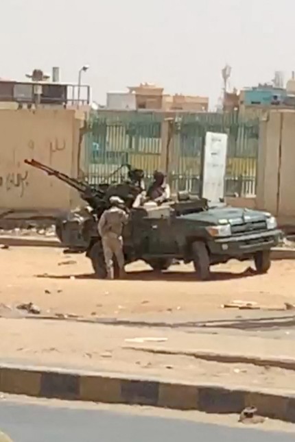 State crisis: combat vehicles and soldiers on the streets of Khartoum.