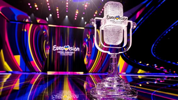 The ESC trophy 2023 (the stage can be seen in the background) © eurovision.tv Photo: Corinne Cumming