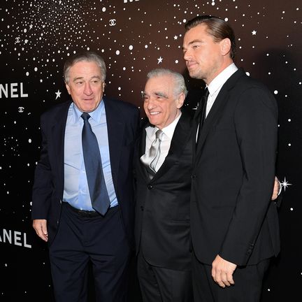 American director Martin Scorsese surrounded by actors Robert De Niro (left) and Leonardo DiCaprio, in New York on November 19, 2018. (DIA DIPASUPIL / WIREIMAGE / GETTY IMAGES)