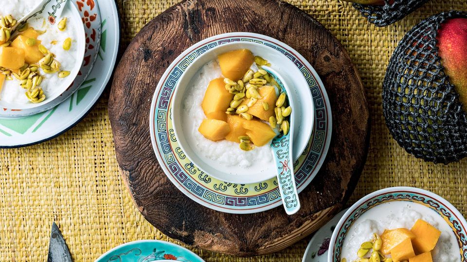 Three bowls of sticky rice with mango
