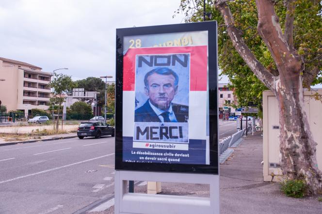 One of the posters representing Emmanuel Macron in the guise of Adolf Hitler, in Avignon, May 18, 2023.