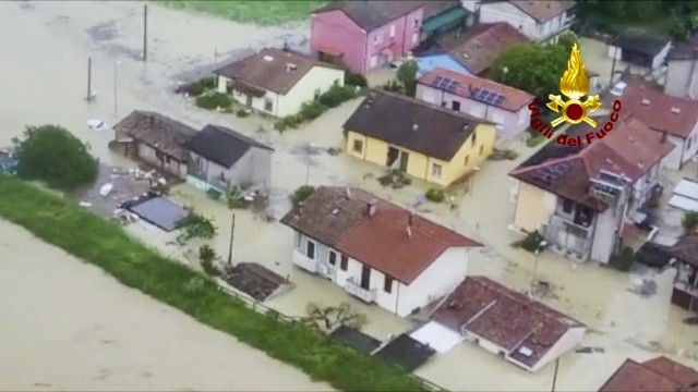 Italy: Country Below: This image provided by the Italian Fire Service shows flooded houses in the Emilia-Romagna region.