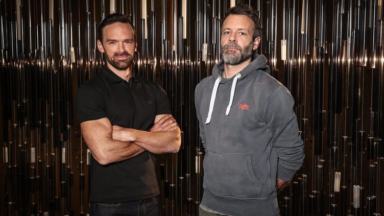Actor Alban Lenoir (left) and director Morgan S. Dalibert, for the release of the film "A.K.A." on Netflix, April 20, 2023. (FRED DUGIT / MAXPPP)