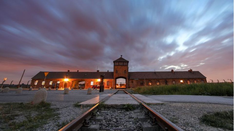 View of the gate to the former Auschwitz-Birkenau extermination camp
