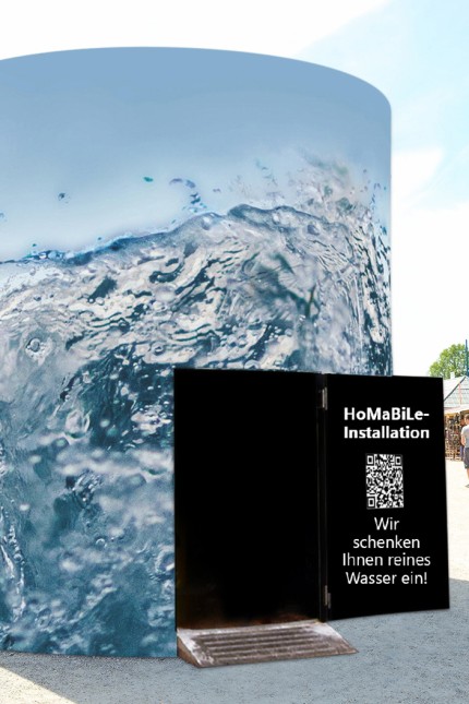 Sommer-Tollwood in München: Die Installation Homabile soll vermitteln, was Wasser wirklich kostet.