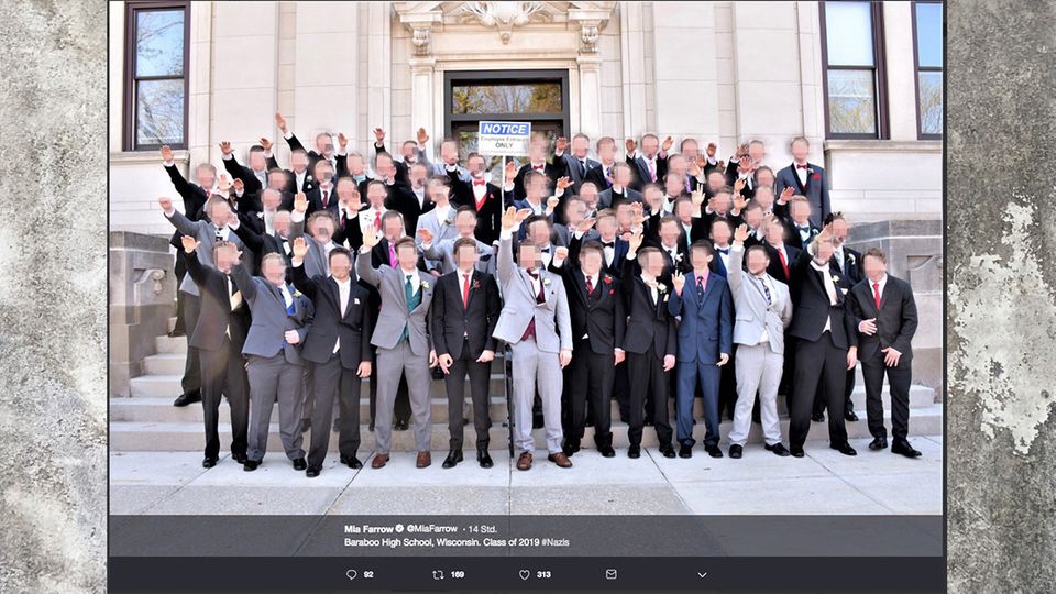 Graduates from Baraboo High School in Wisconsin perform the Nazi salute