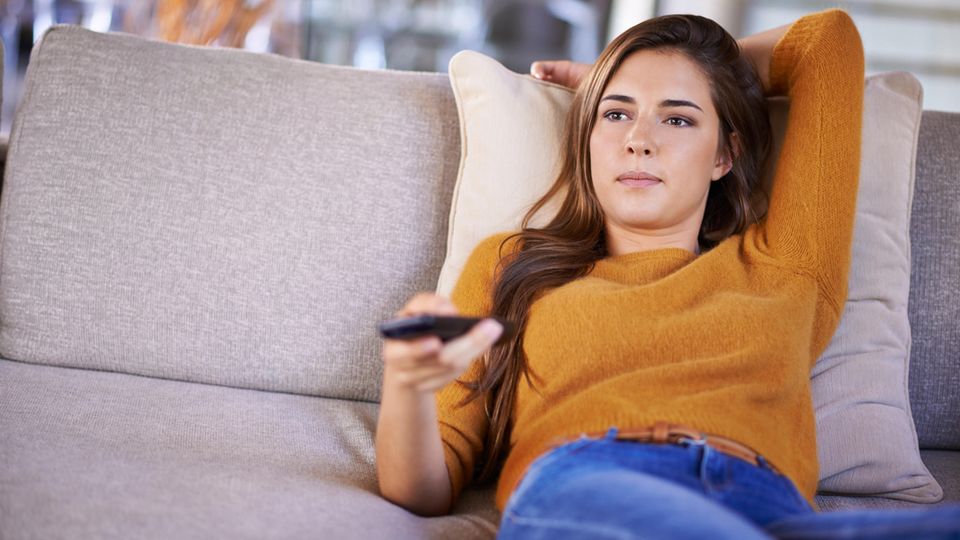 Woman watches Amazon Prime Video on a TV