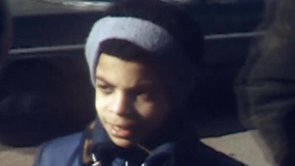 Prince as a child being interviewed by a reporter