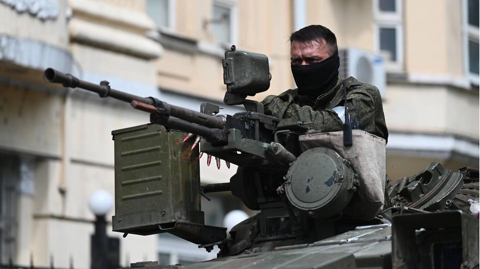 A mercenary from the Wagner Group sits in an armored vehicle in Rostov.  The mercenary group occupied parts of the Russian city on Saturday.