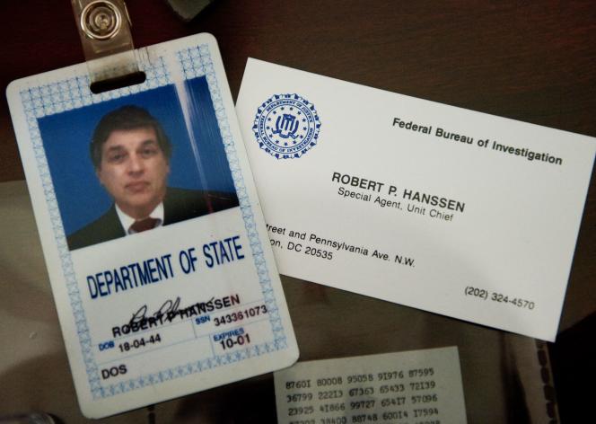 An identification badge and business card from former FBI agent Robert Hanssen.
