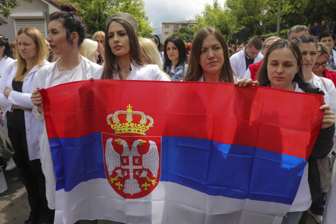 The Serb community protest outside the town hall of Zvecan in northern Kosovo on May 31, 2023, after a mayor elected by a minority of Albanian speakers took office last week in municipal elections on May 23, 2023. April 2023 that the Serbs had boycotted.