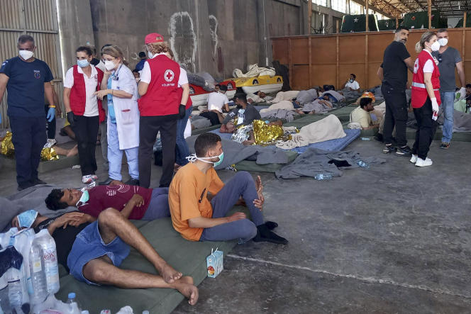 Part of the survivors of the sinking of the fishing vessel from Libya, in a warehouse in the port of the city of Kalamata (Greece), June 14, 2023. 