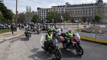 During a demonstration of bikers against the compulsory technical control for two-wheelers, on April 22, 2023 in Paris.  (SERGE TENANI / HANS LUCAS / AFP)