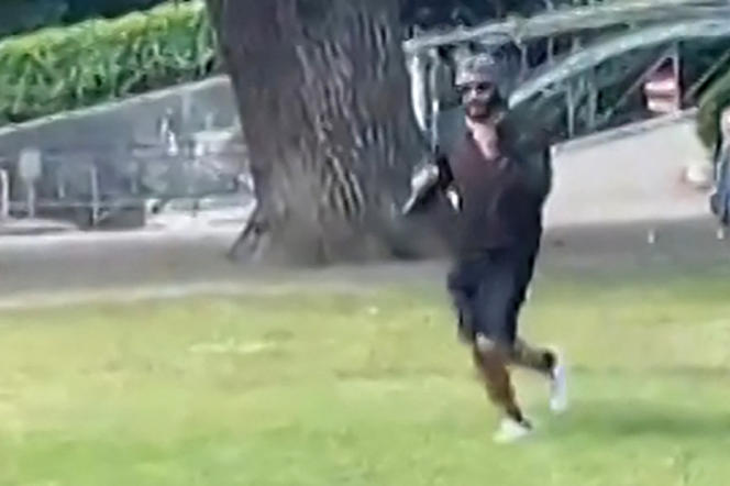 Screen capture of a video where we see the suspect fleeing after the attack, in Annecy, on June 8, 2023. (Photo by AFPTV / AFP)